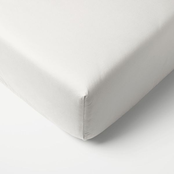 Jersey fitted sheet for a crib 120x60 cm in white made from organic cotton by Petite Amélie